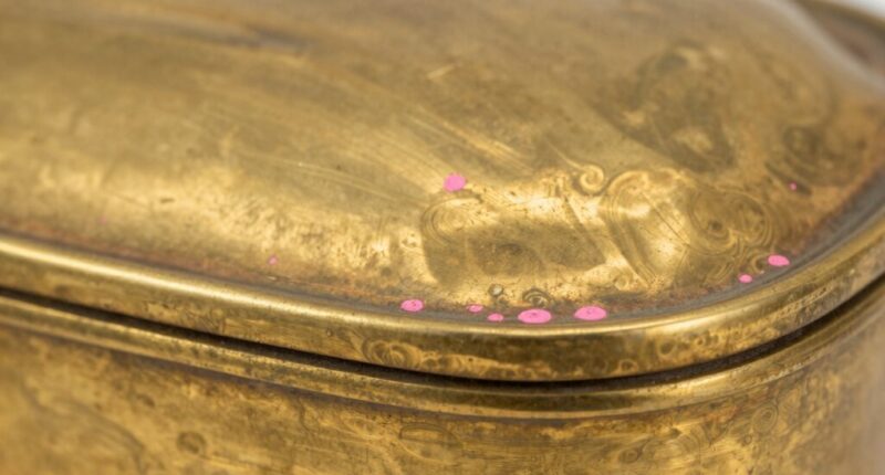 brass turning pink frequently